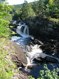 Loch, Lake, Waterfall in Contin, Scotland Loch, Lake, Waterfall in The Highlands, Scotland